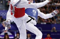 乐鱼体育娱乐-跆拳道男子公斤级决赛，伊朗选手胜出